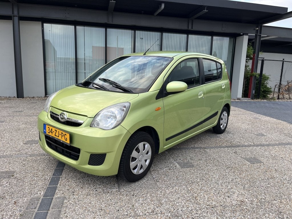 Daihatsu Cuore 1.0 Premium 5D Elektr pakket Apk (bj 2008), Auto's, Voorwielaandrijving, Metallic lak, 18 €/maand, 4 stoelen