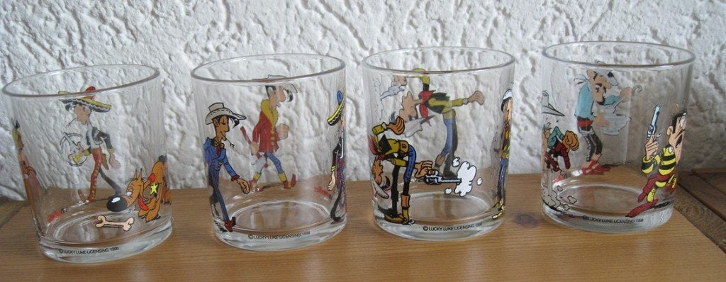Complete set 4 Lucky Luke glazen Nutella 1998, Verzamelen, Stripfiguren, Ophalen of Verzenden, Overige figuren, Nieuw, Gebruiksvoorwerp