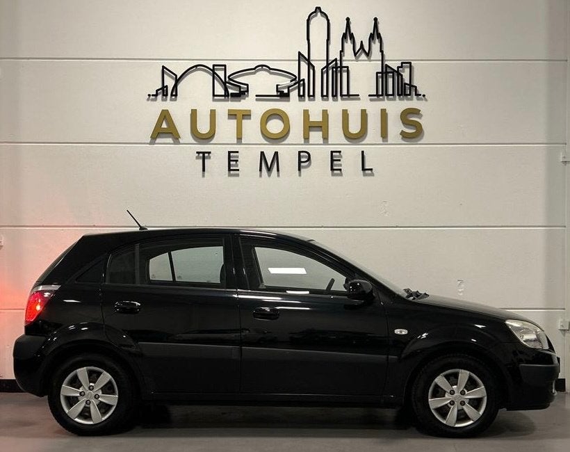 Kia Rio 1.4 All Stars Sport Automaat Airco Elektrische Ramen, Auto's, Kia, Stof, Gebruikt, 14 km/l, Grijs