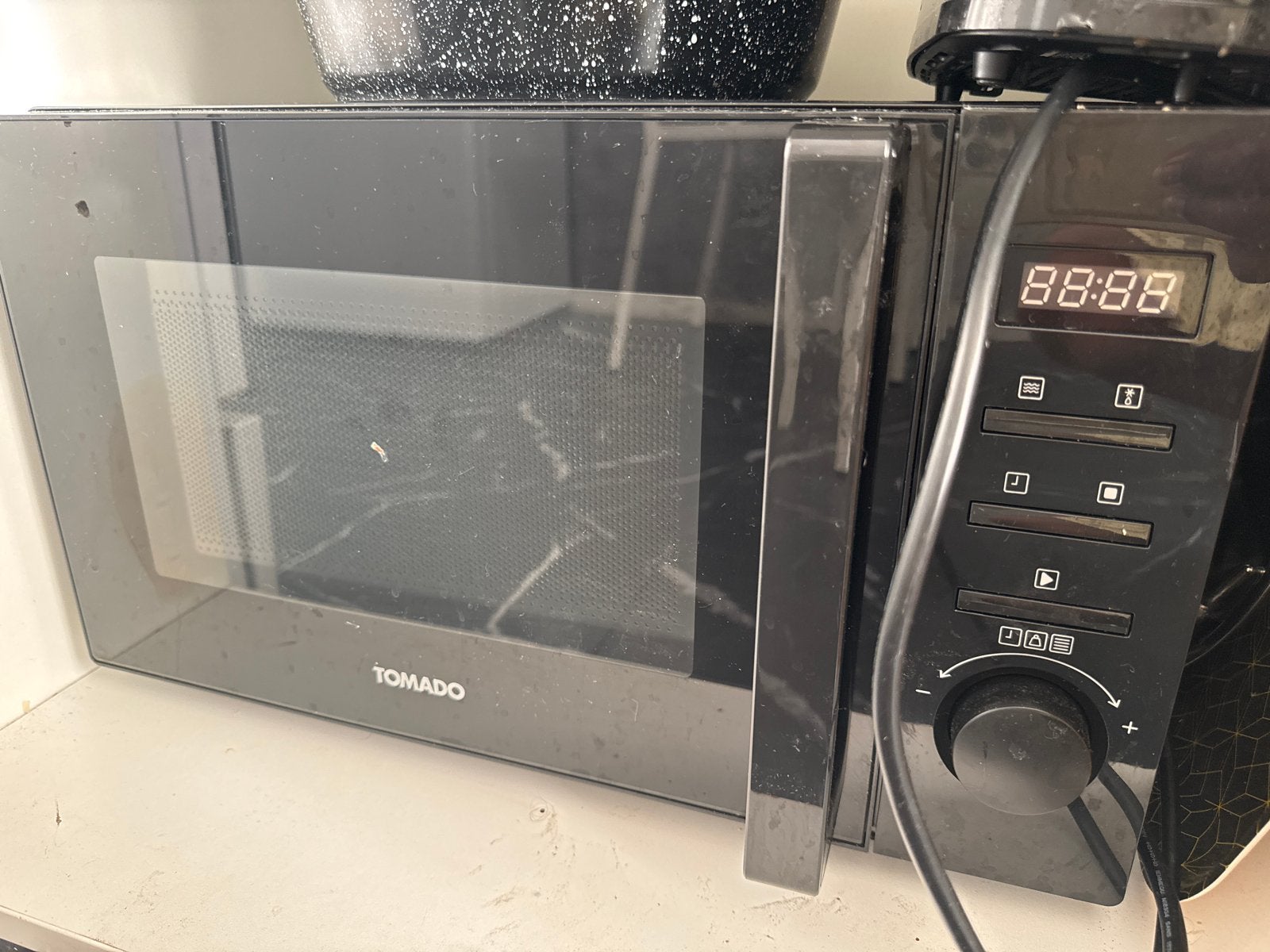 Tomado Magnetron - Minder dan een jaar gebruikt, Ophalen, Magnetron, Zo goed als nieuw, 45 tot 60 cm
