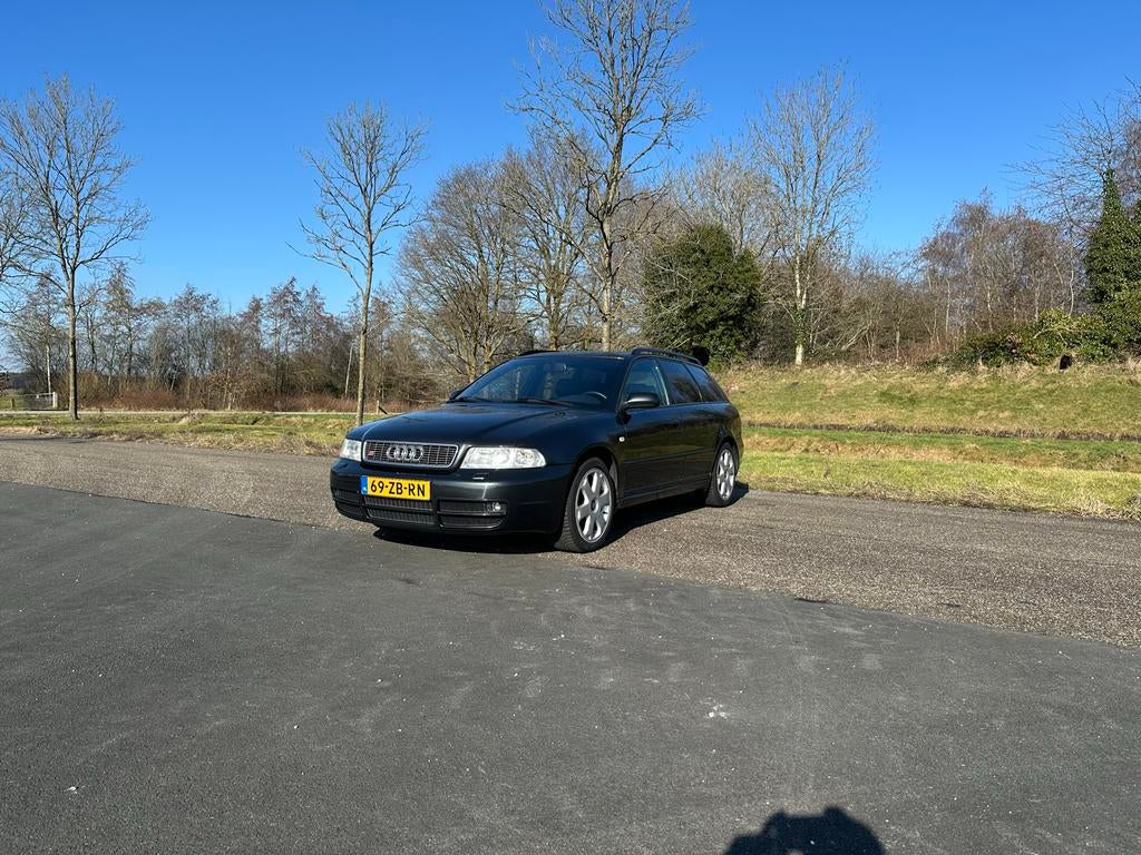 Audi A4 2.7 V6 Avant Quattro 195KW 1999 Zwart, Auto's, Audi, 2671 cc, Stoelverwarming, Zwart, 1545 kg