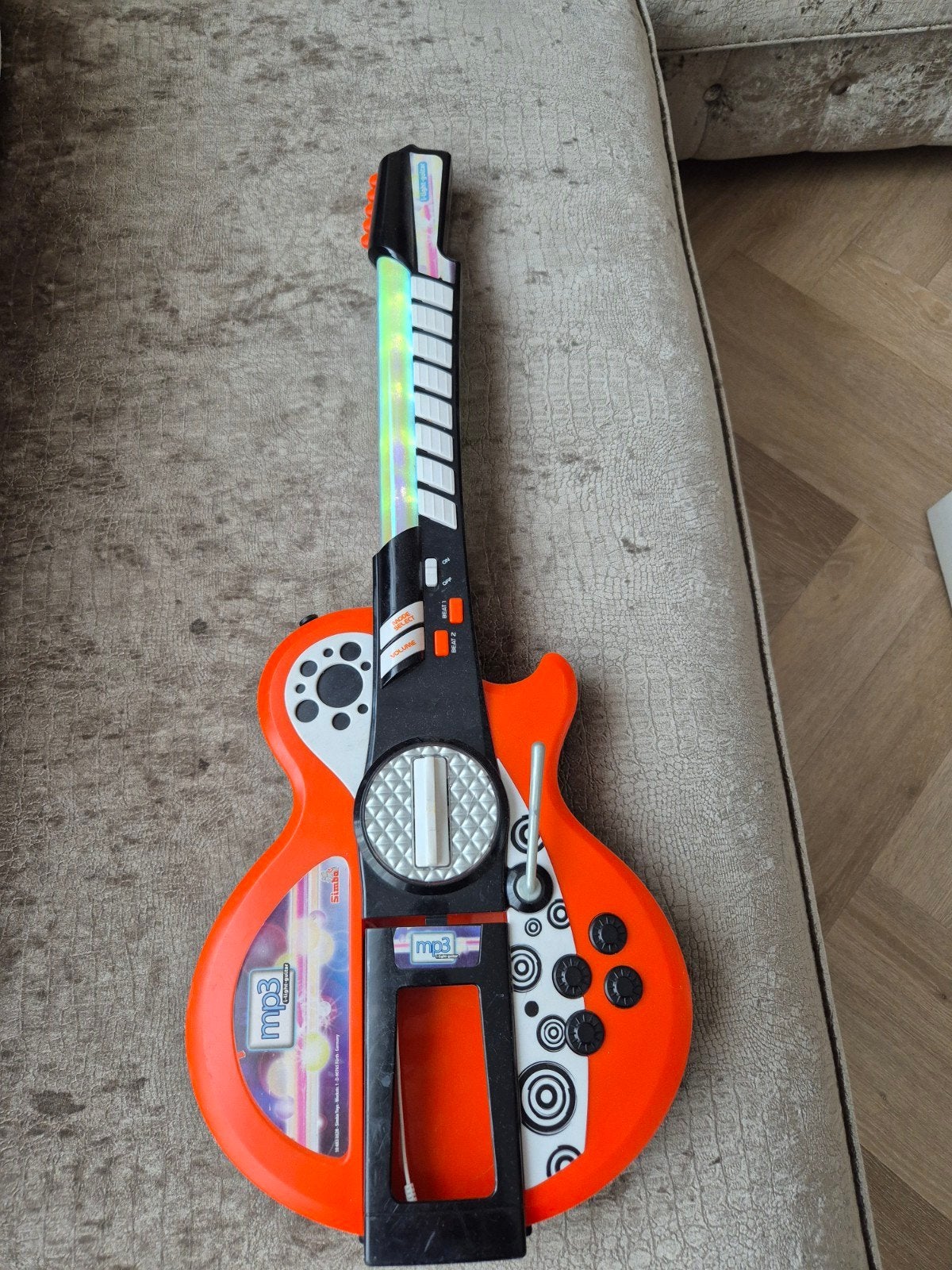 Te koop kinder gitaar met geluid en licht, Ophalen