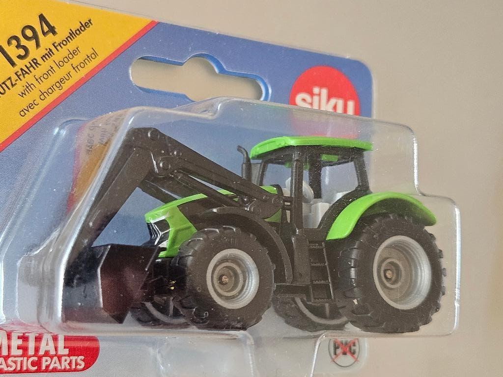 1:87 Deutz Agrotron met voorlader in OVP Siku € 6, Verzenden, Zo goed als nieuw, Hijskraan, Tractor of Landbouw, SIKU