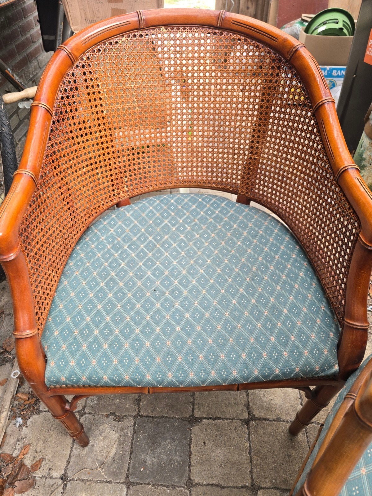Vintage rotan stoel met webbing en kussen, Ophalen