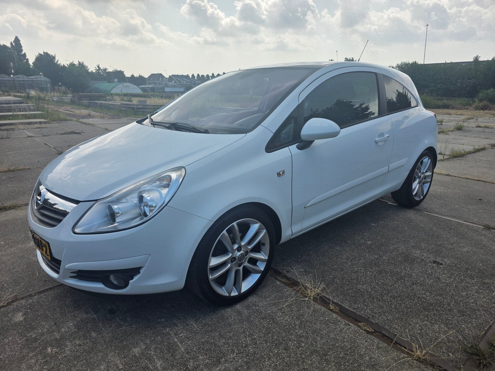Opel Corsa 1.4 16V 3D WR 2010 Wit, Auto's, Opel, Voorwielaandrijving, 40 €/maand, 4 cilinders, Wit