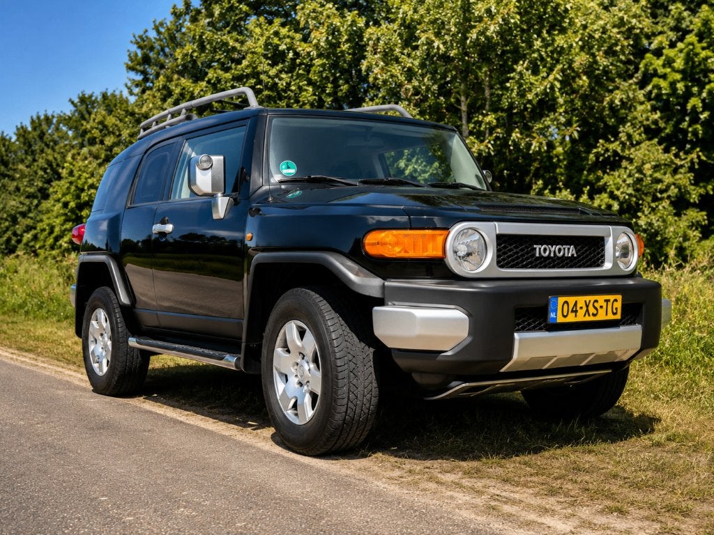 Toyota FJ Cruiser - 4.0 V6 Benzine Automaat Zwart 4WD, Auto's, Zwart, Origineel Nederlands, Vierwielaandrijving, 6 cilinders