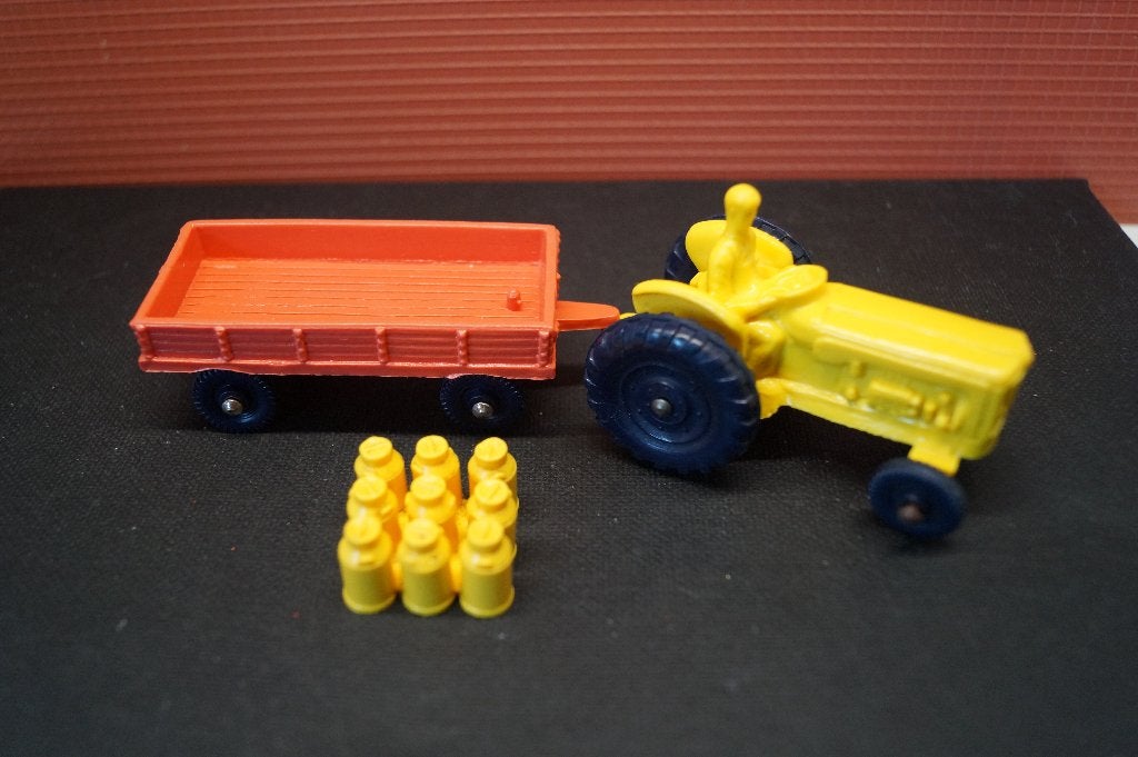 Antieke Tomte Laerdal Tractor met trailer en melkbussen., Antiek en Kunst, Antiek | Speelgoed, Verzenden