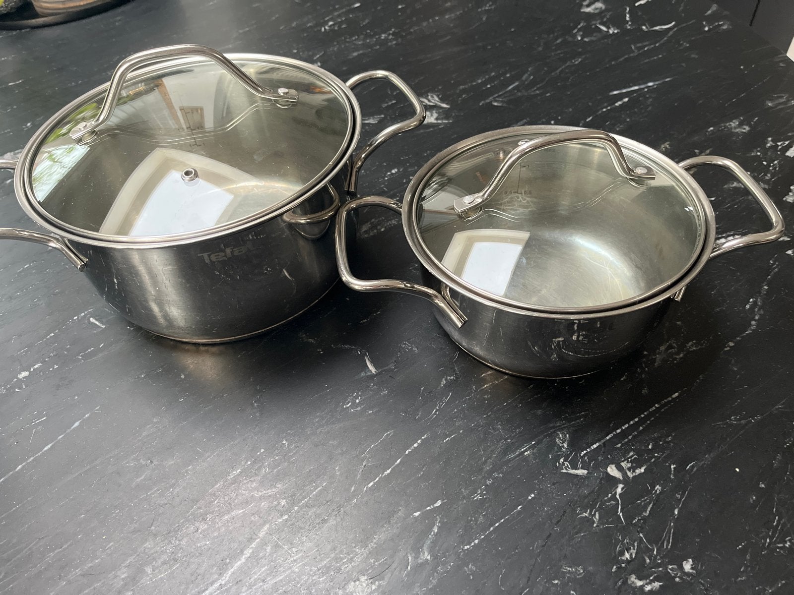 Tefal Pannenset RVS - 2pannen met deksels, Huis en Inrichting, Keuken | Potten en Pannen, Gebruikt, Inductieplaat, Pannenset, Ophalen of Verzenden