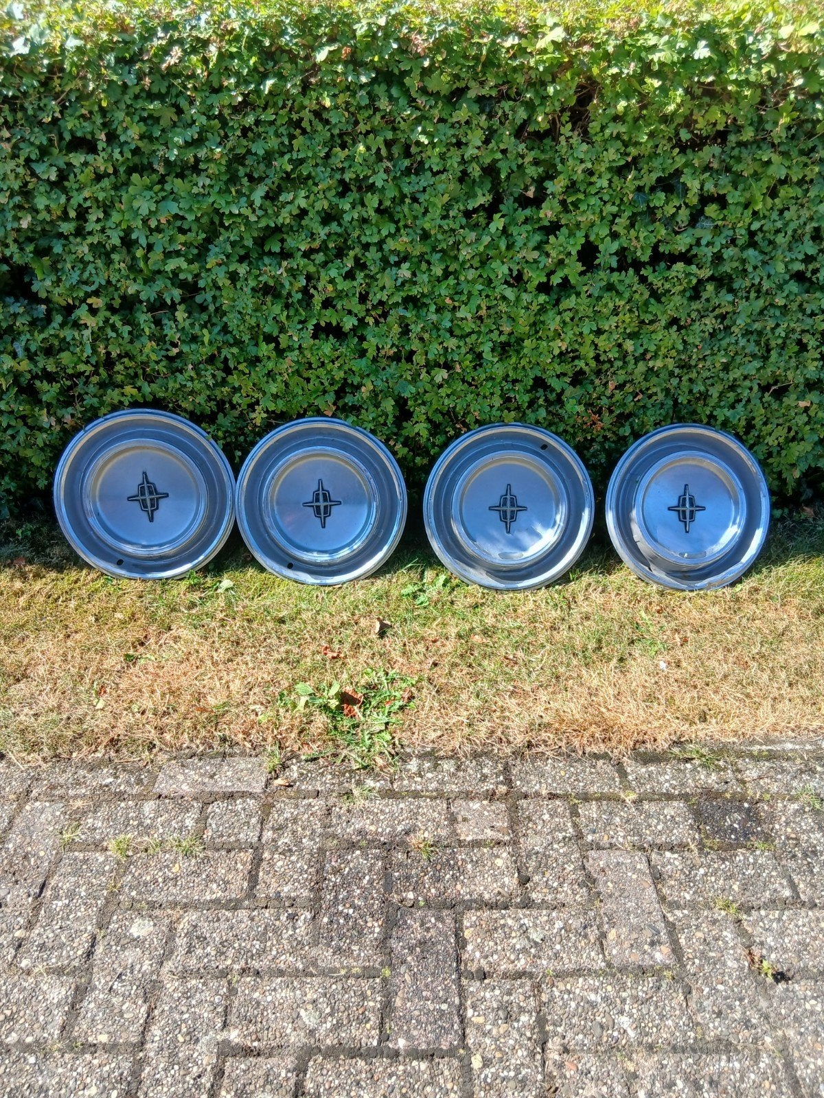 Set wieldoppen 15 inch Lincoln 1971, Ophalen of Verzenden, Lincoln