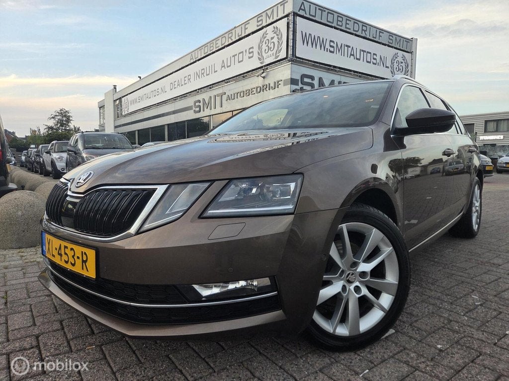 Skoda Octavia Combi 1.0 TSI Greentech Style Business DSG, Auto's, Skoda, Gebruikt, Bruin, 116 pk, Origineel Nederlands