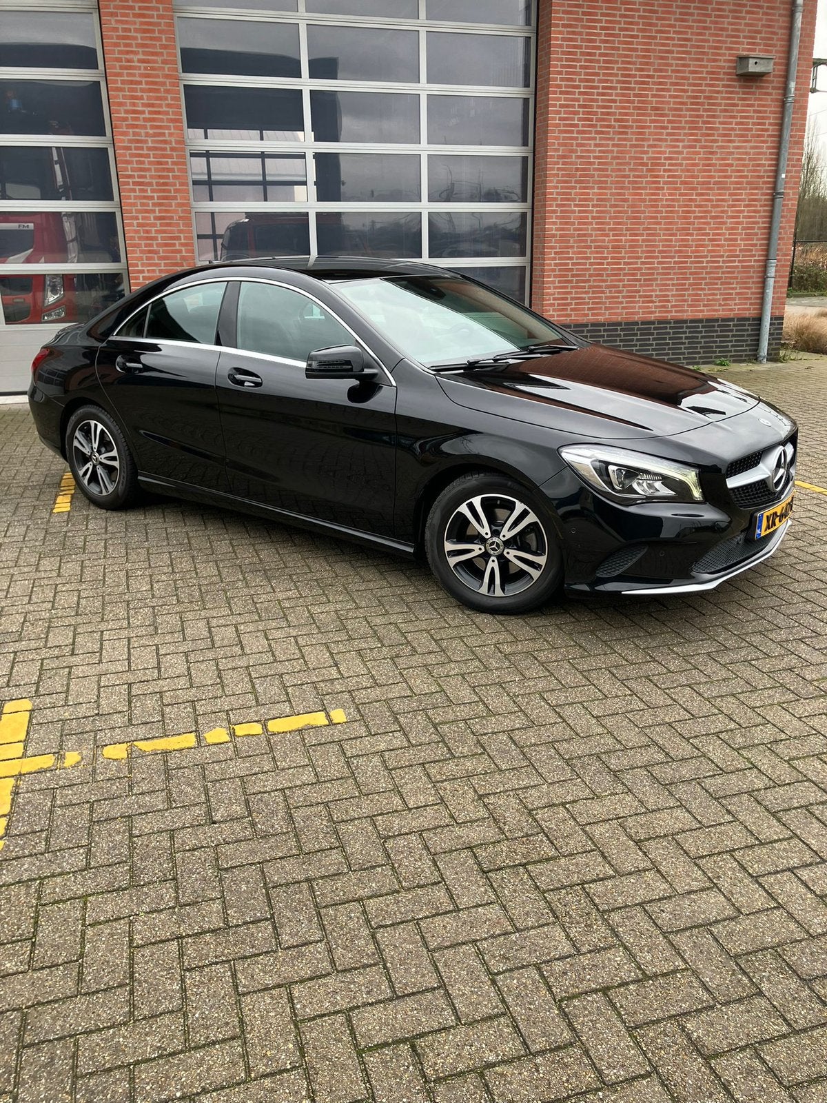 Mercedes-Benz CLA 180 Ambition, 122pk 7G-DCT 2019 Zwart, Auto's, 4 cilinders, 715 kg, Leder en Stof, 1200 kg