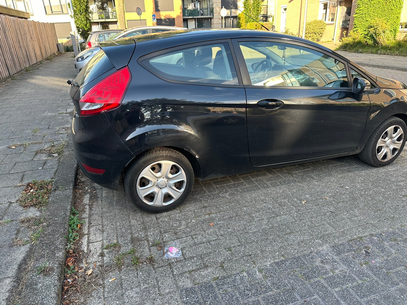 Ford Fiësta 1.25 44KW 3DR 2012 Zwart, Auto's, Voorwielaandrijving, Stof, 4 cilinders, Zwart