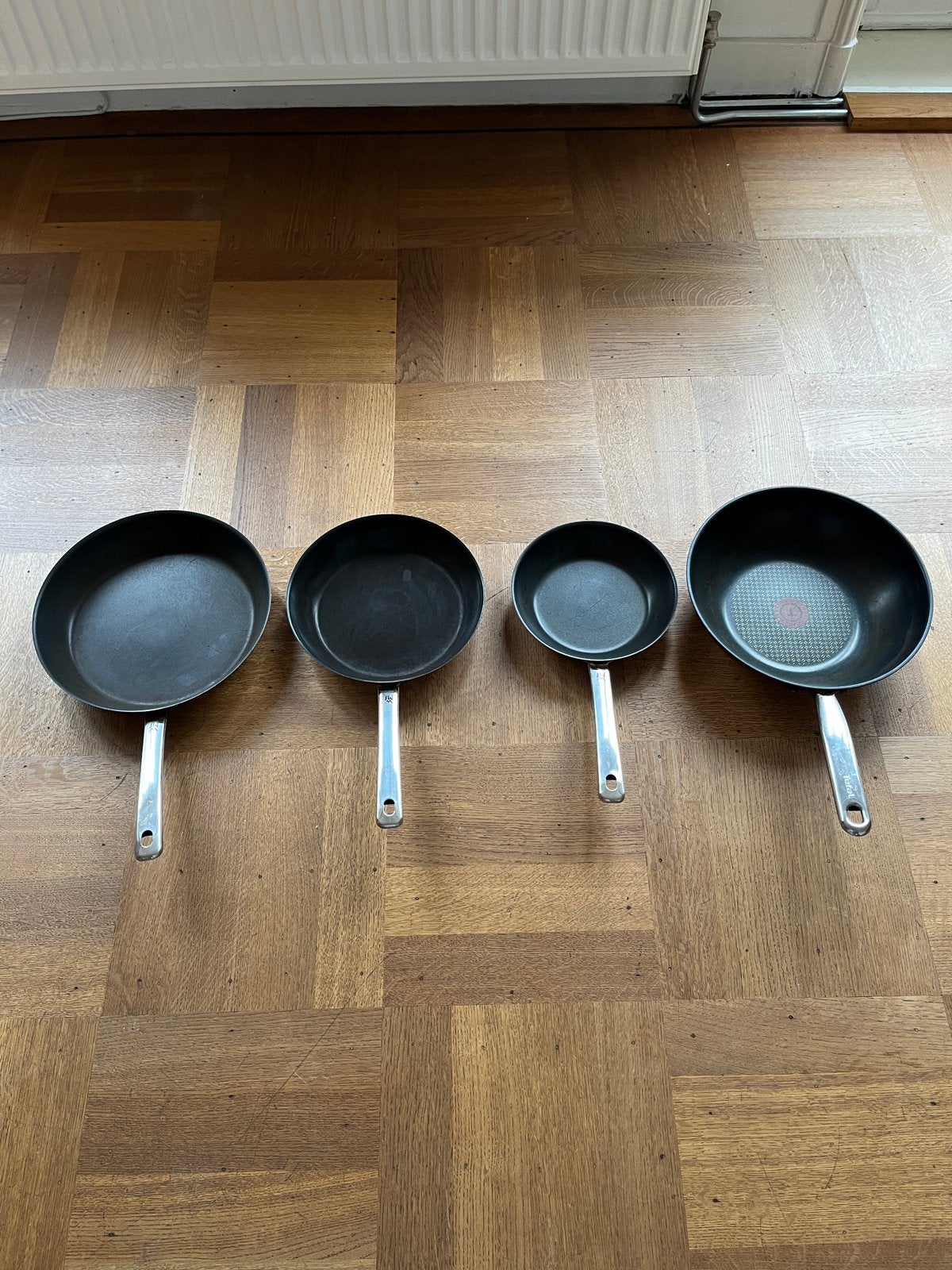 Pannenset: 3 WMF pannen en 1 Tefal wokpan, Ophalen, Gebruikt, Antiaanbaklaag, Pannenset