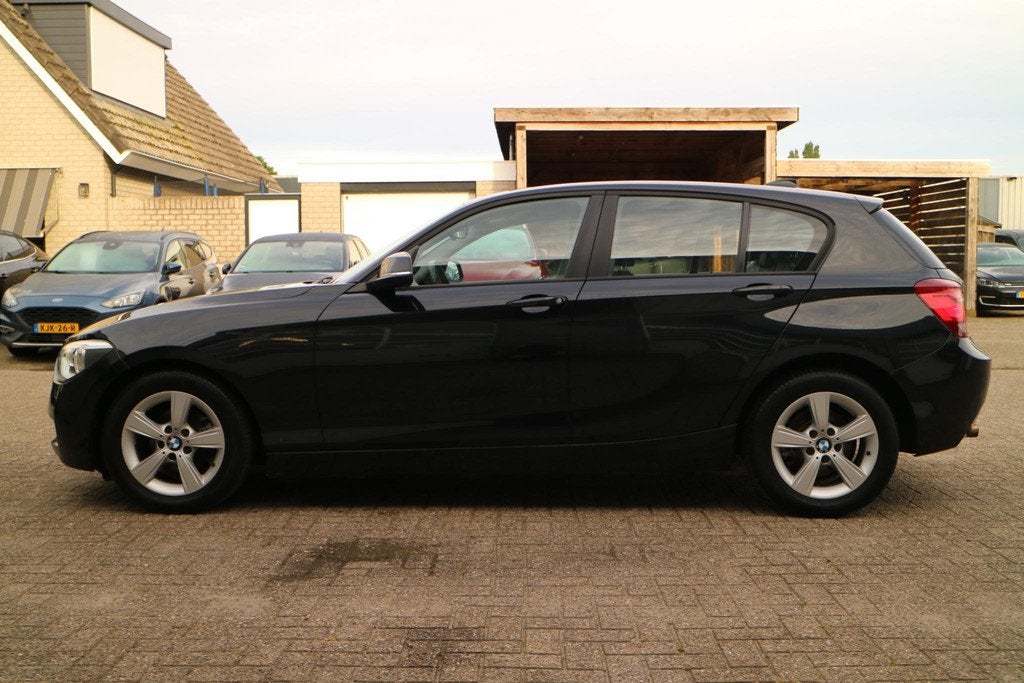 BMW 1-serie 114i Upgrade Edition | Navi | Goed Onderhouden!, Auto's, BMW, 1-Serie, Euro 5, Achterwielaandrijving, Gebruikt