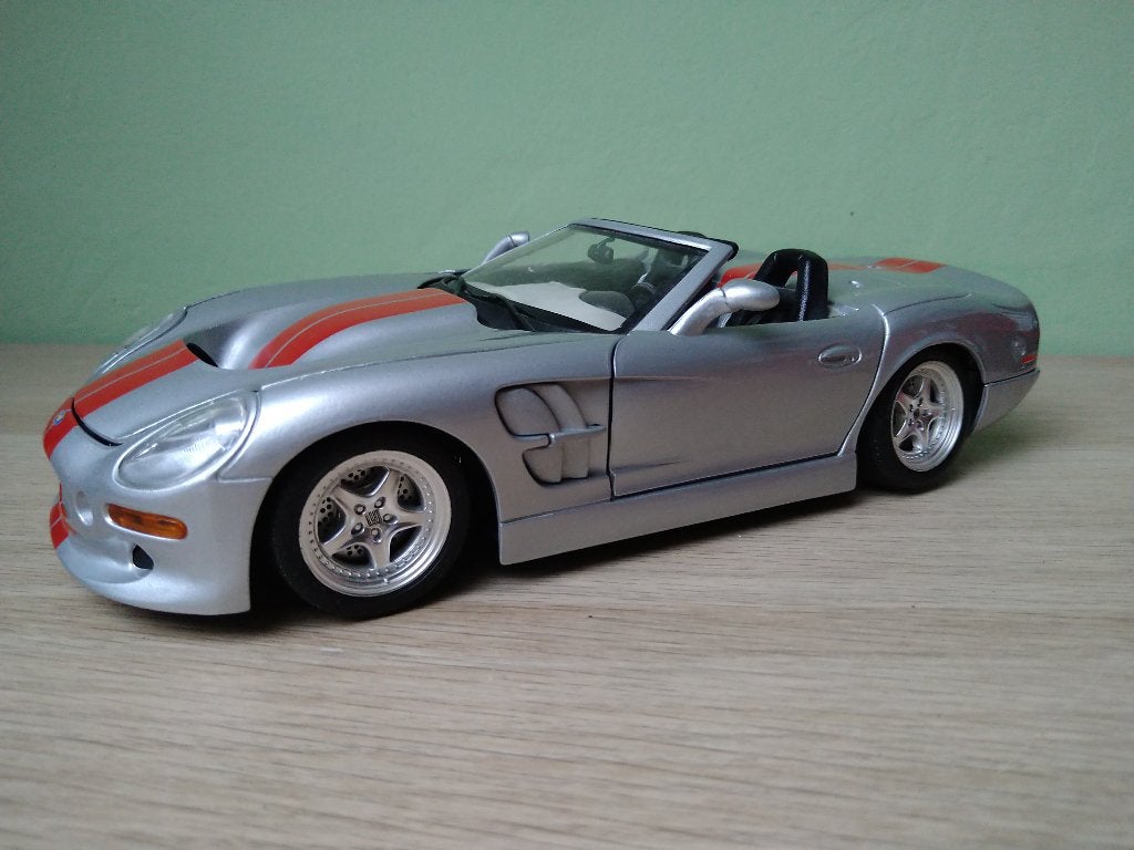Shelby Series 1 Bburago grijs 1:18, Ophalen of Verzenden, Zo goed als nieuw, Auto, Bburago