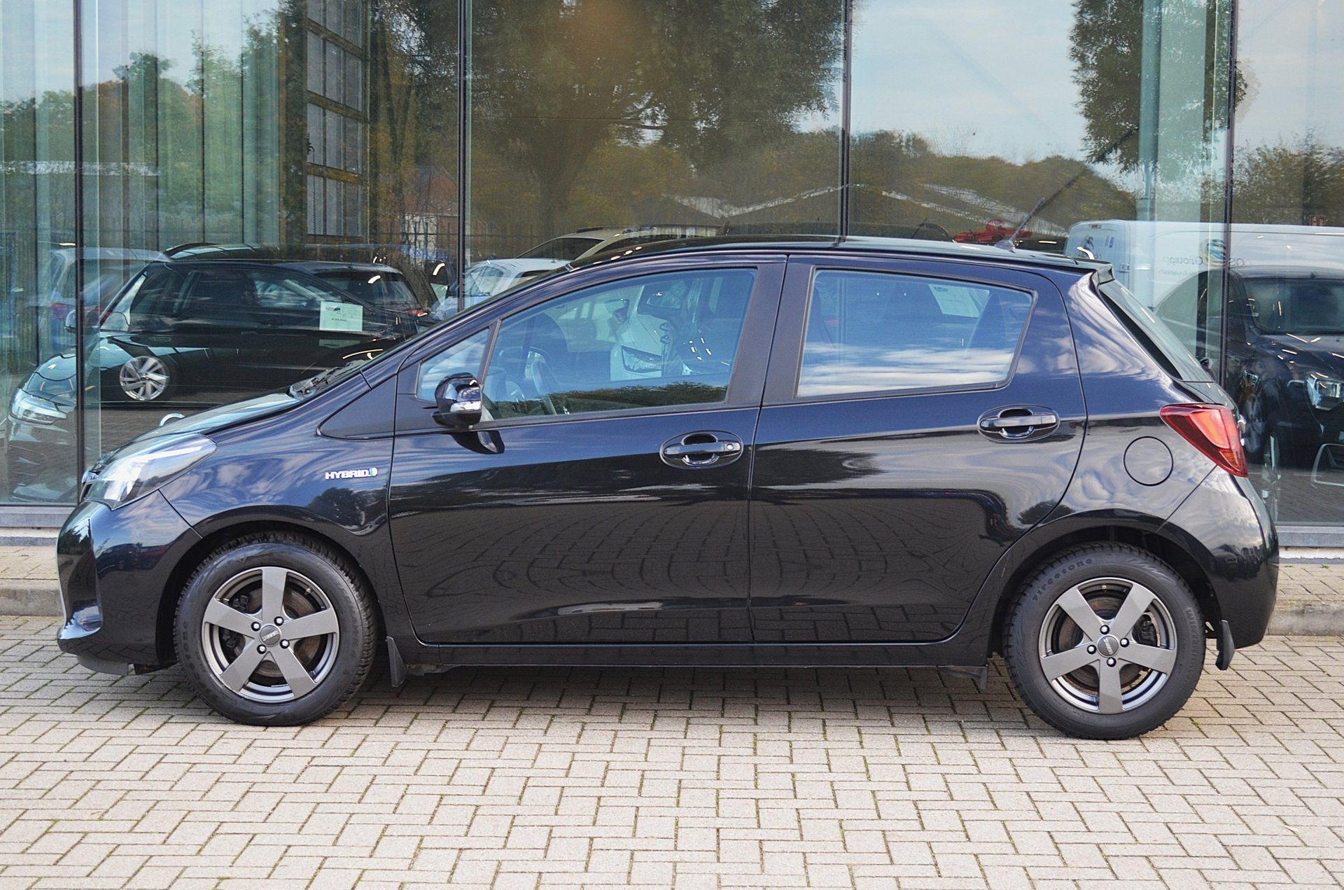 Toyota Yaris 1.5 Hybrid Business Plus | Camera | Climate con, Auto's, Gebruikt, 4 cilinders, Zwart, Bedrijf