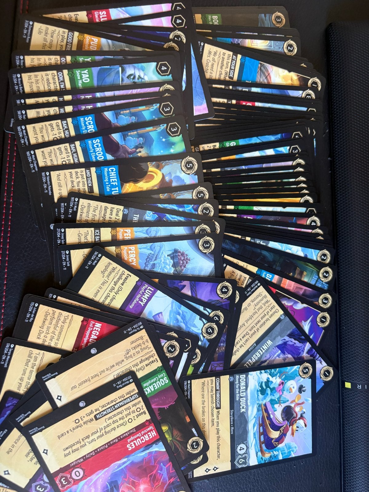 Disney Lorcana kaarten - 155 kaarten, Ophalen of Verzenden, Zo goed als nieuw, Meerdere kaarten, Foil