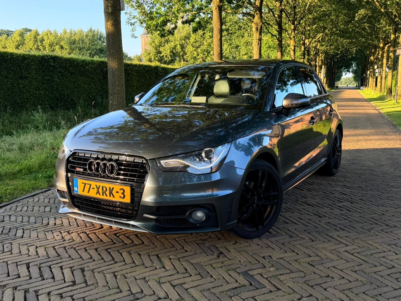 Audi A1 1.2 Tfsi 63KW SB 2012 Grijs, Auto's, Audi, A1, Zwart, 4 cilinders, Leder en Stof
