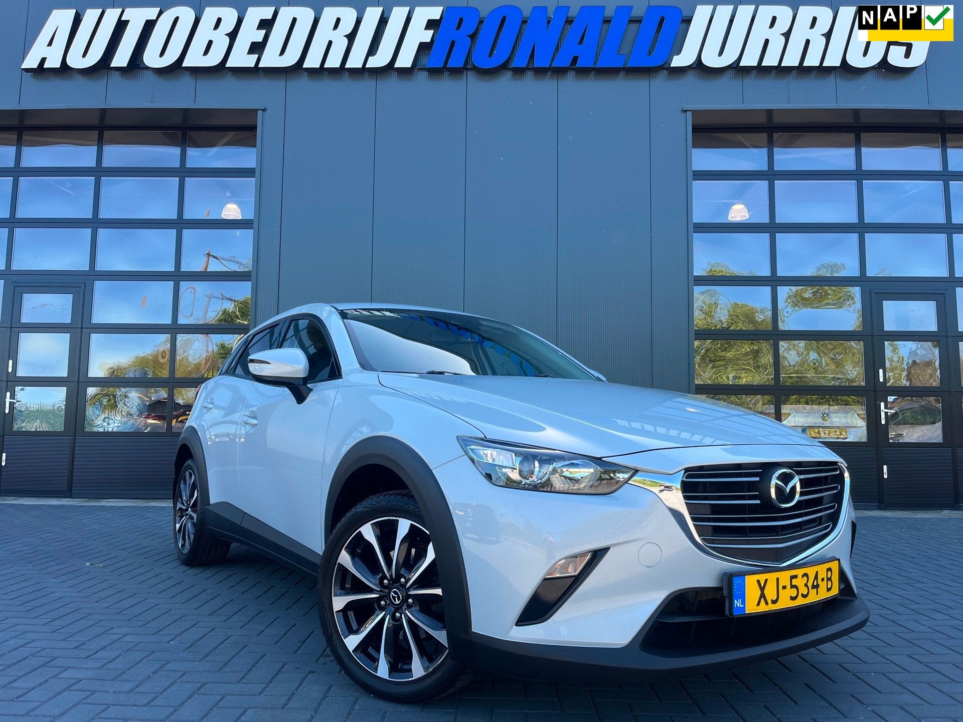 Mazda CX-3 2.0 SkyActiv-G 120 Sport Selected NLAuto/Trekhaak, Auto's, Mazda, 1998 cc, Stof, 4 cilinders, Automatische klimaatregeling