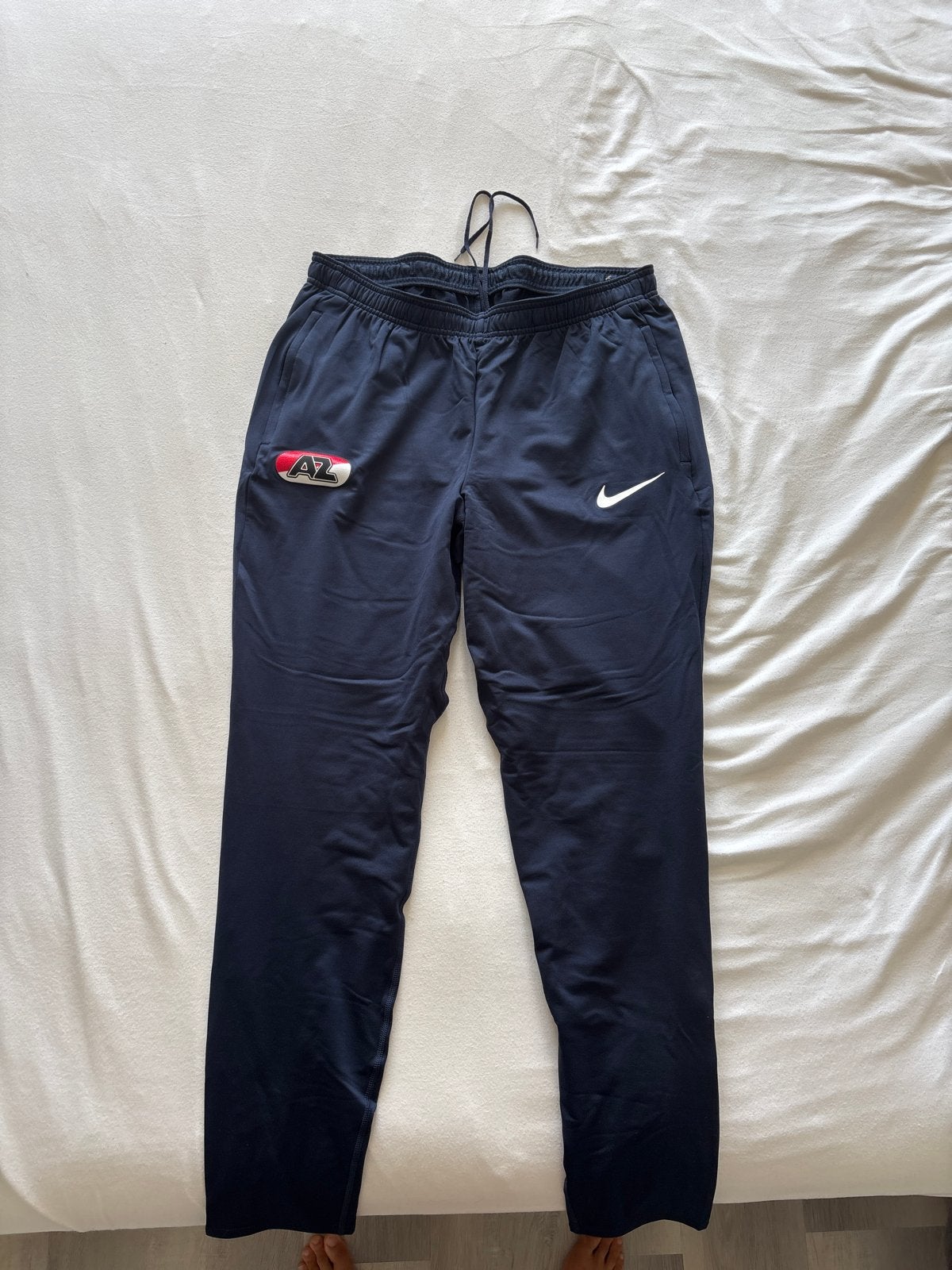 Nike trainingsbroek met AY-logo, Ophalen of Verzenden, Zo goed als nieuw, Algemeen, Maat 48/50 (M)