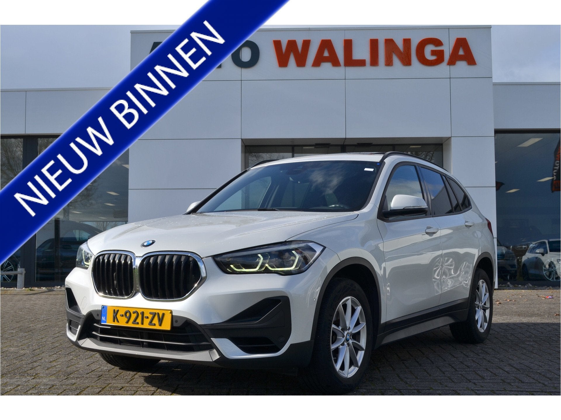 BMW X1 sDrive20i 180pk Automaat | Panoramdak | Carplay | Hea, Auto's, BMW, Stof, 4 cilinders, 179 pk, Wit