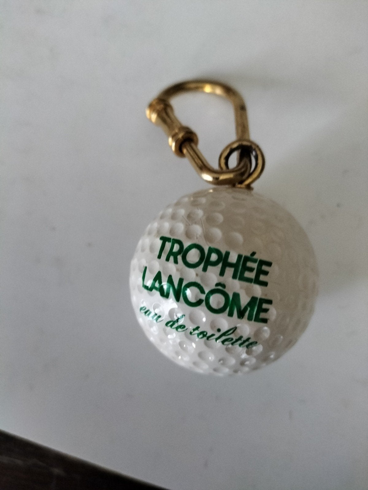 sleutelhanger golfbal, Ophalen
