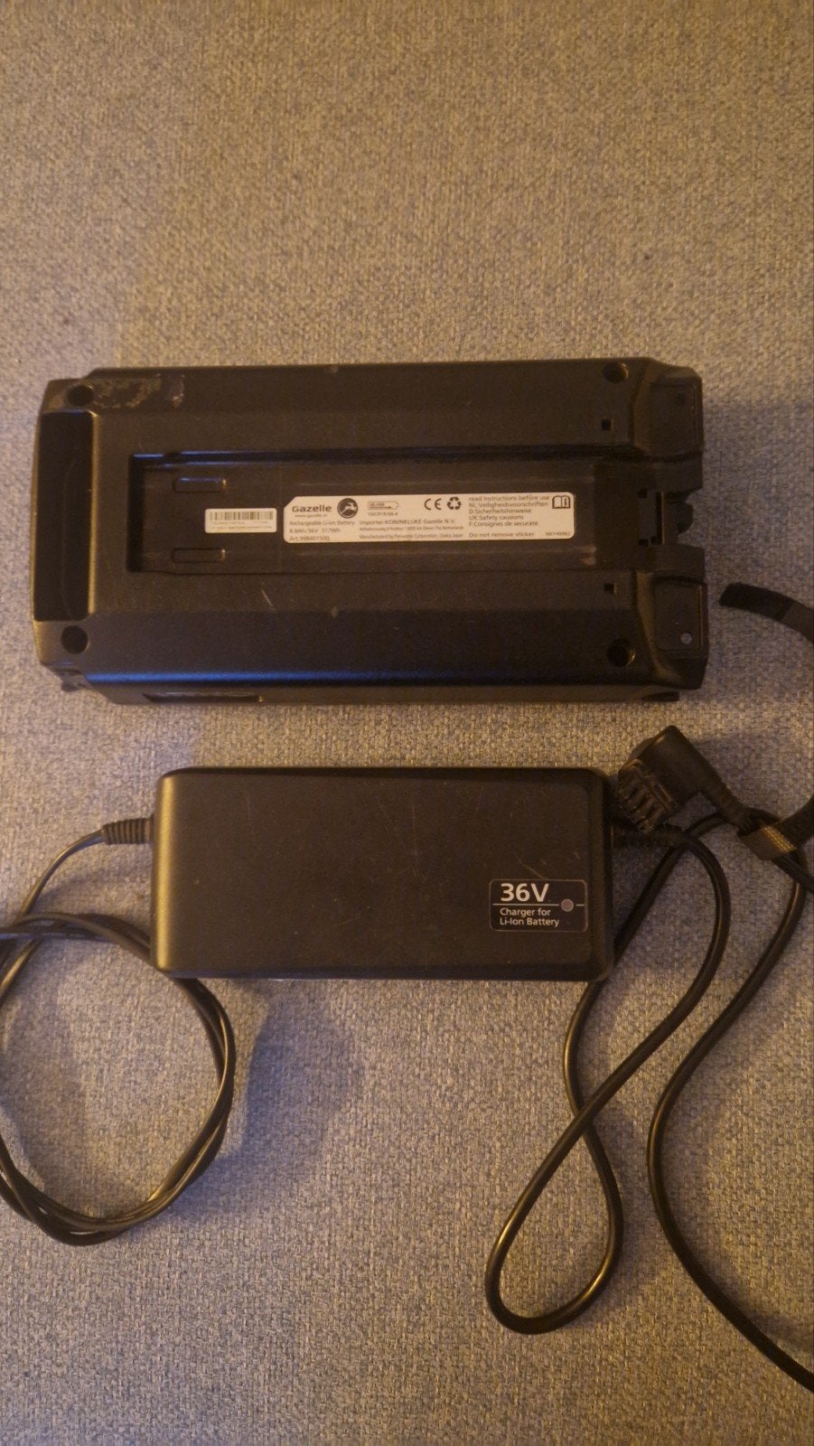 Gazelle Panasonic accu en oplader., Zo goed als nieuw
