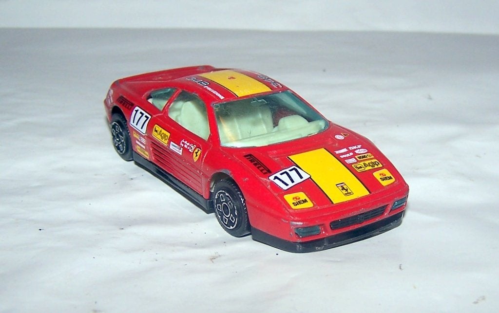 Bburago Ferrari 248 TB Evoluzione. 1/43. Izgs., Ophalen of Verzenden, Zo goed als nieuw, Auto, Overige merken