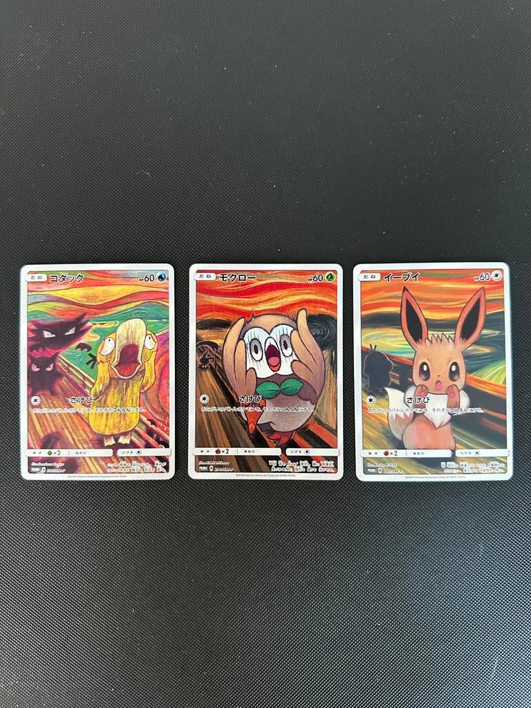 Psyduck, Eevee, Rowlett Japan Sun&Moon Promos Pokemon Kaart