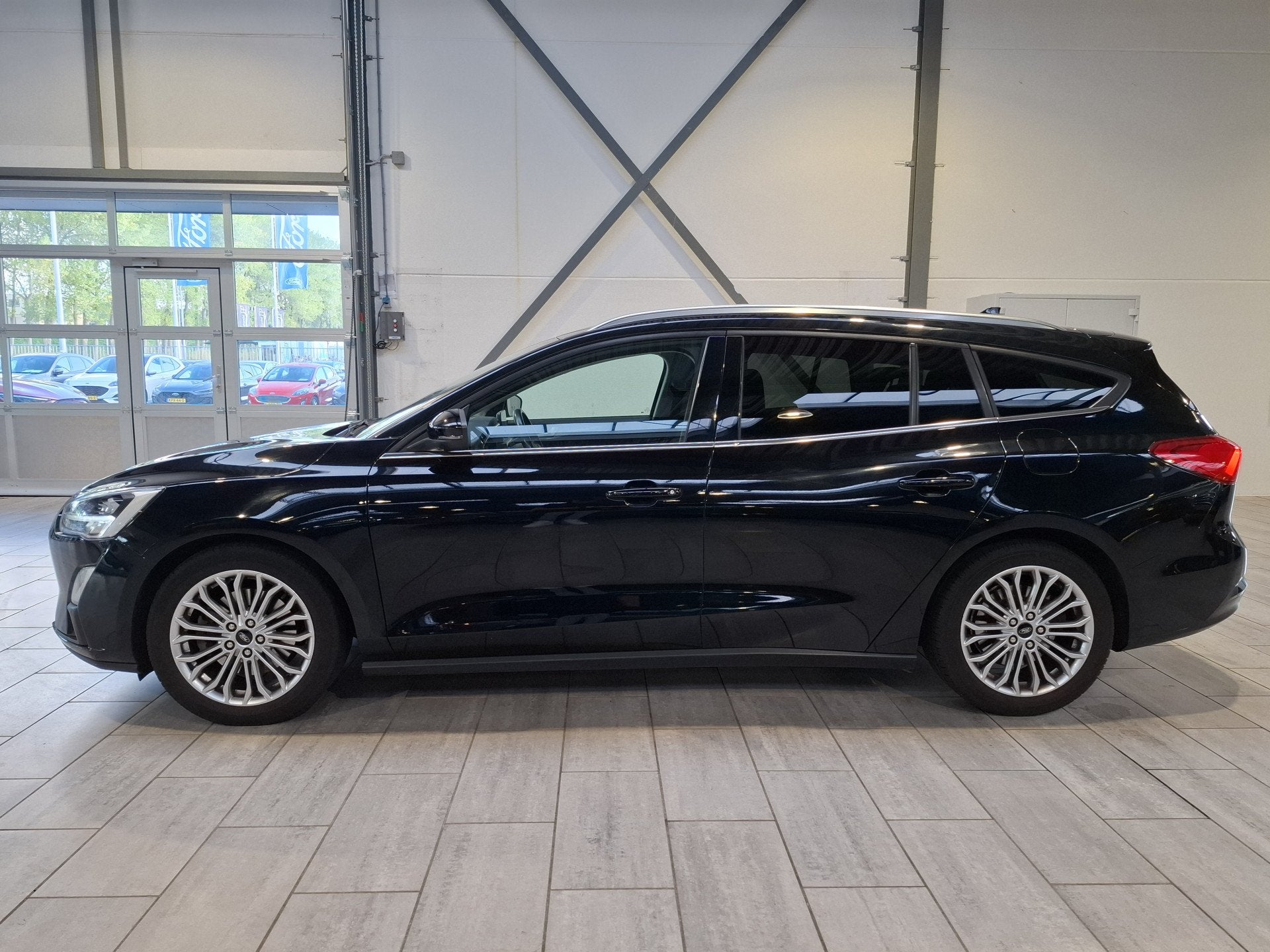 Ford FOCUS Wagon EcoBoost 125 pk Titanium | Trekhaak | 17" |, Dealer onderhouden, Gebruikt, Met garantie (alle), 1283 kg