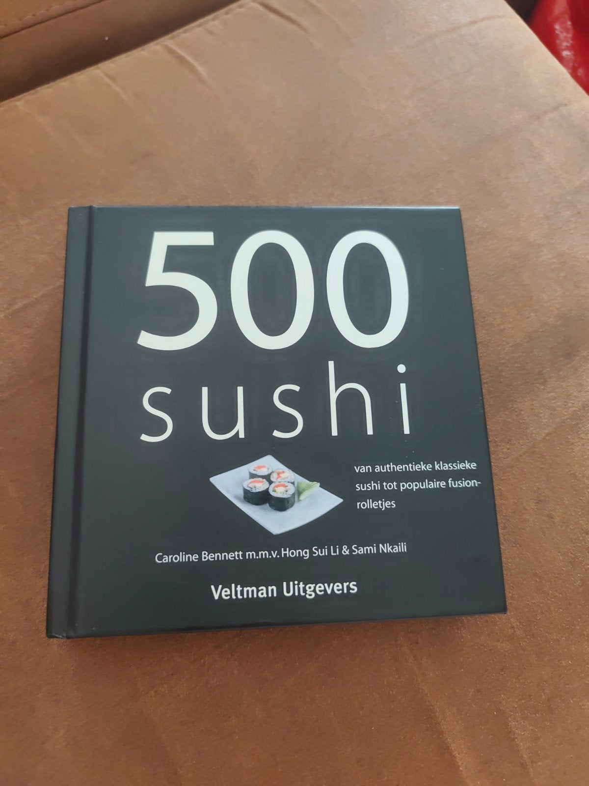 500 Sushi: Van klassiek tot fusion-rolletjes, Boeken, Hoofdgerechten, Azië en Oosters, Ophalen of Verzenden, Zo goed als nieuw