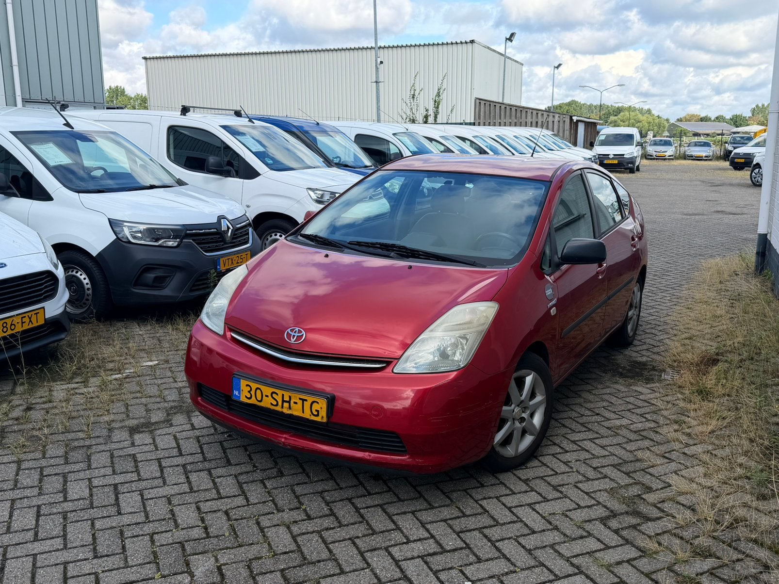 Toyota Prius 1.5 HSD 2006 Rood, 1497 cc, 4 cilinders, 23 km/l, Origineel Nederlands
