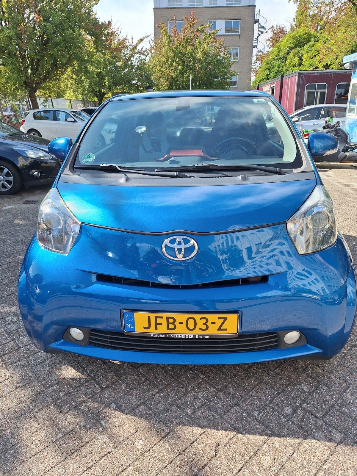 Toyota IQ 1.3 Vvt-i CVT 2011 Blauw, Zwart, 4 cilinders, Leder en Stof, 905 kg