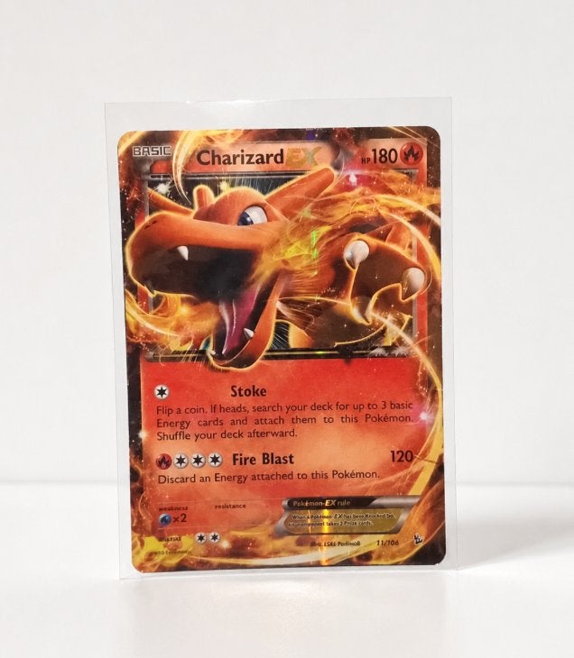 Pokémon Charizard, Ophalen of Verzenden, Zo goed als nieuw, Meerdere kaarten