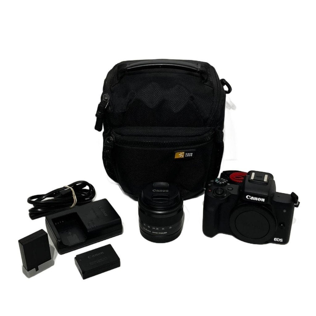 Canon EOS M50 + 15-45mm Lens, 2 Accu's en Lader ZGAN in Hoes, Audio, Tv en Foto, Ophalen of Verzenden, Zo goed als nieuw, Canon
