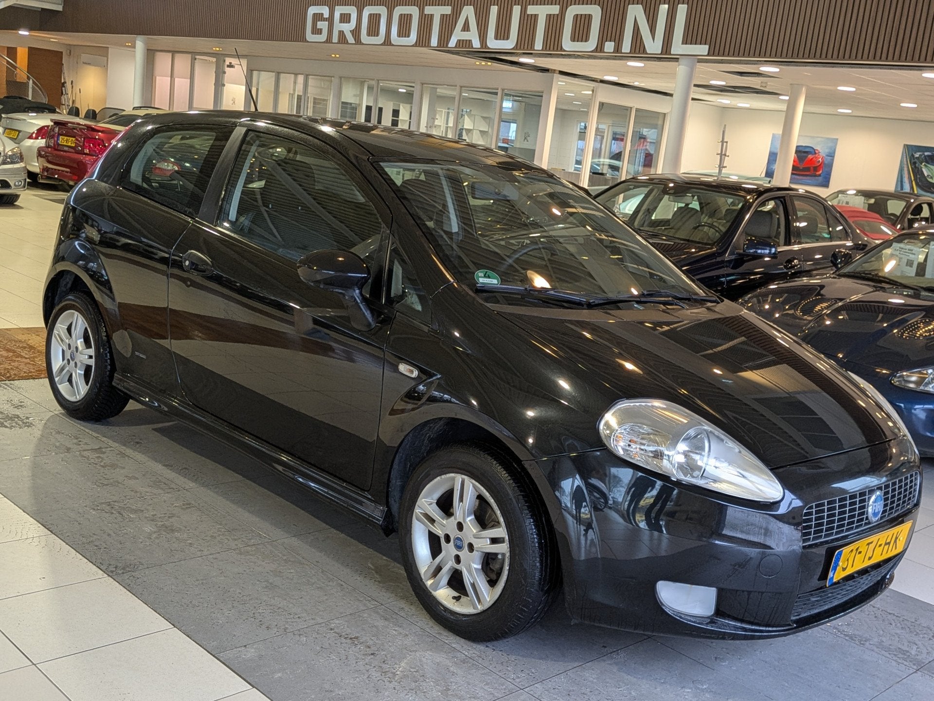 Fiat Grande Punto 1.4 Edizione Prima Airco, Stuurbekrachtigi, Voorwielaandrijving, Stof, 4 cilinders, 400 kg