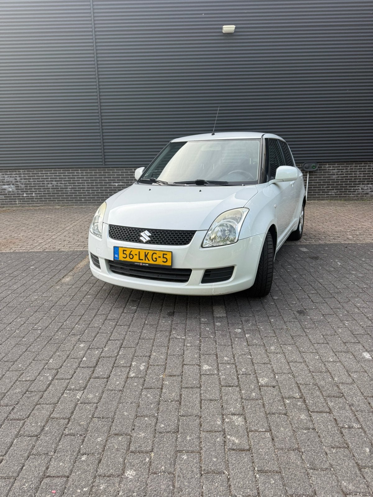 Suzuki Swift 1.3 5D 2010 Wit, Auto's, Voorwielaandrijving, Stof, 40 €/maand, 400 kg