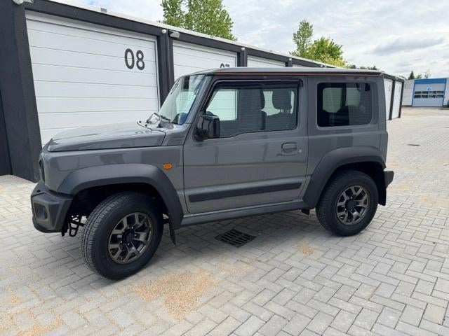 Suzuki Jimny 1.5 Carplay | 4X4 | Airco | LED | Jaar Garantie, Auto's, Suzuki, Stof, Lane Keeping Assist, 4 cilinders, 102 pk