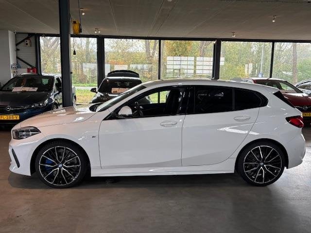 BMW 1 Serie (f40) 118i 140pk Executive M-Sport plus Pack, Auto's, BMW, Stof, Gebruikt, Wit, Origineel Nederlands
