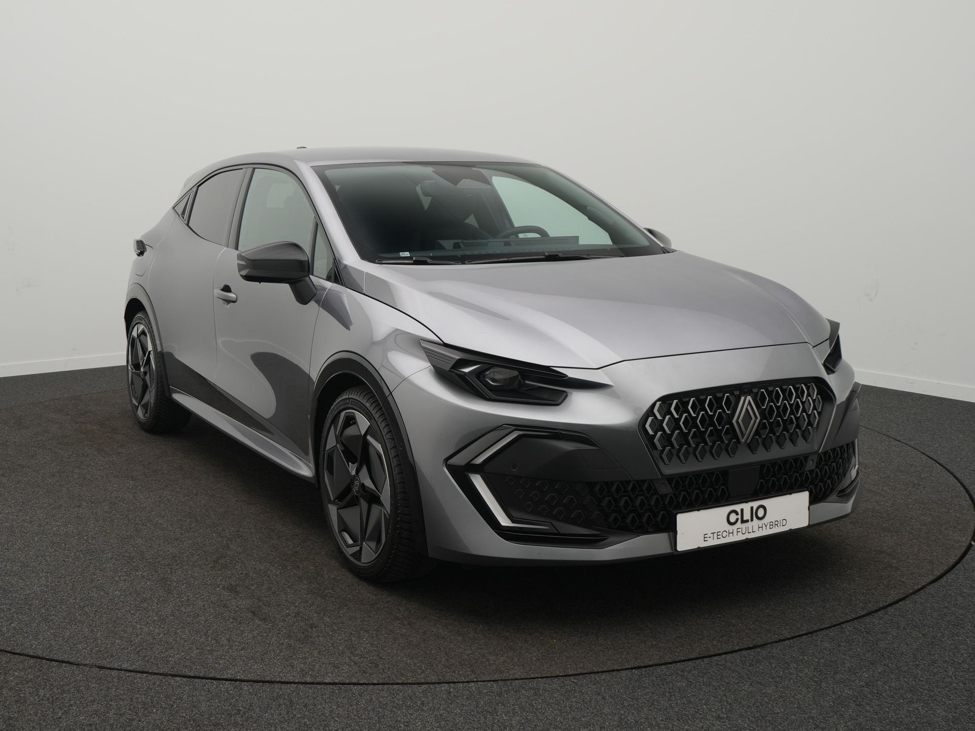 Renault Clio 1.8 Hybrid 160 techno - Demo - All Season Bande, Gebruikt, 4 cilinders, 1246 kg, Leder en Stof