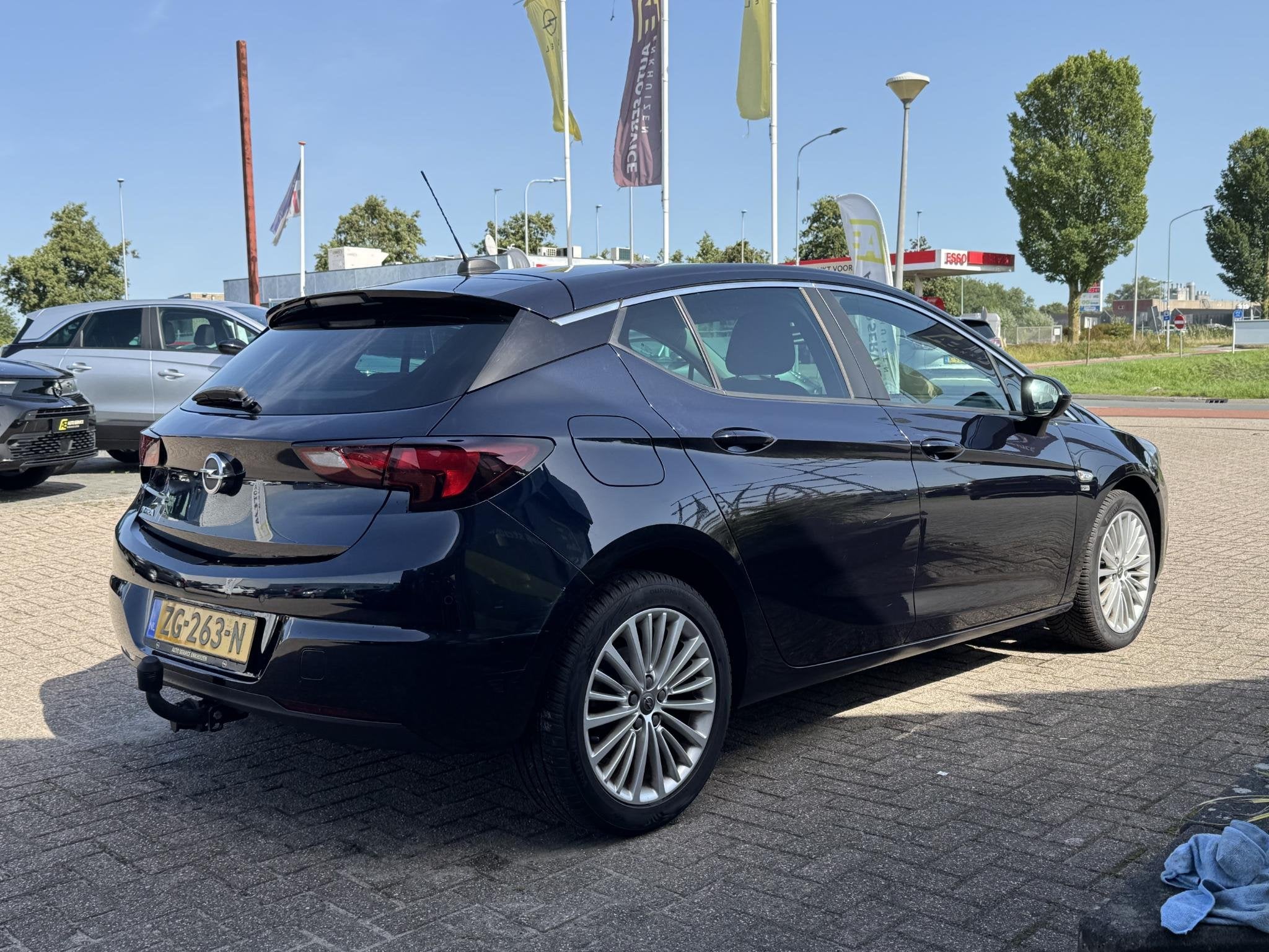 Opel Astra 1.0 Turbo 120 Jaar Edition Rijklaar inclusief gar, Auto's, Opel, 12 maanden, Stof, Gebruikt, Blauw