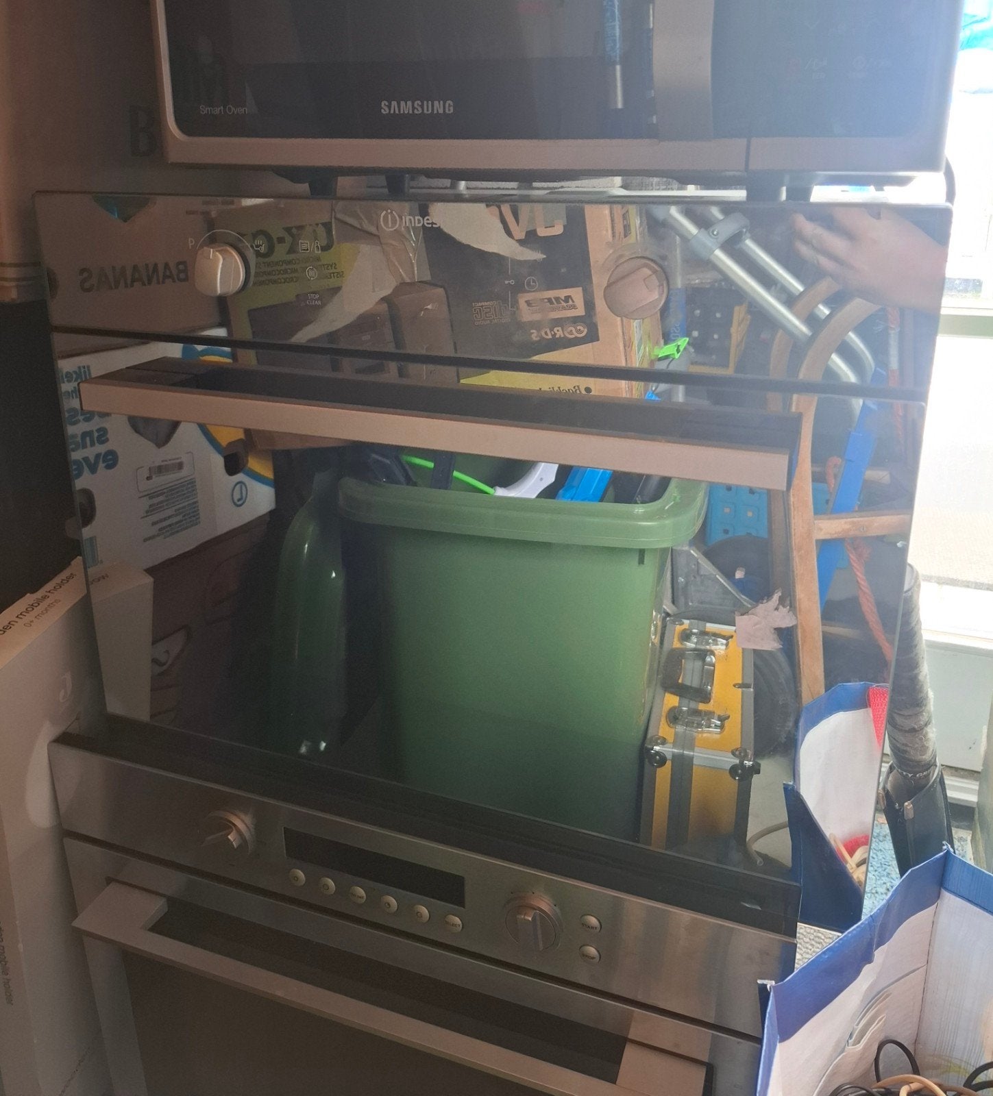 Indesit inbouwoven, Ophalen