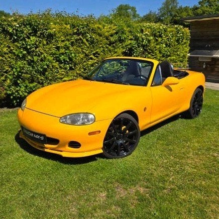 Mazda MX-5 1.8 I AUT 2002 Geel, Auto's, Mazda, Automaat, 40 €/maand, Zwart, 4 cilinders
