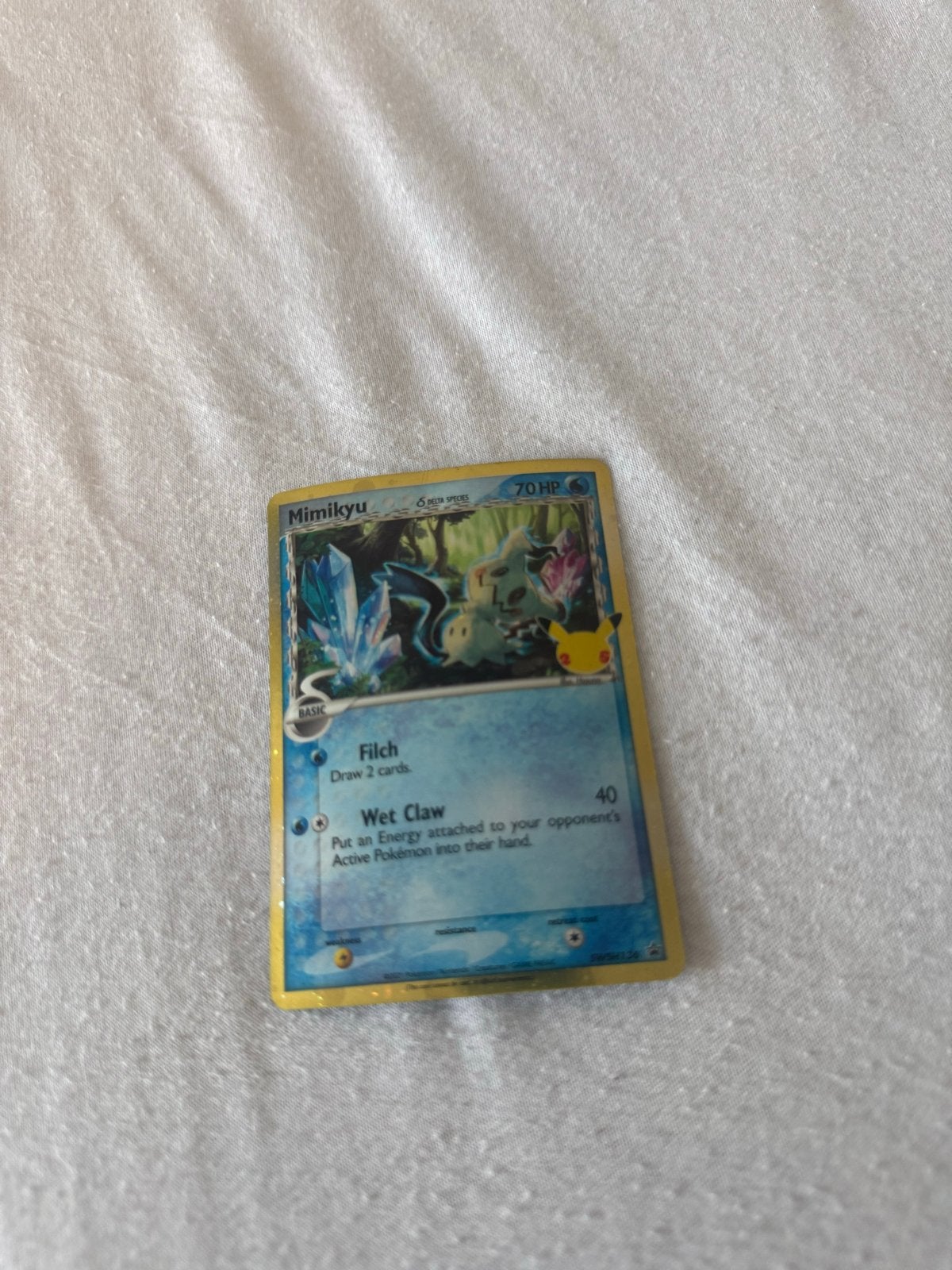 Mimikyu Pokémon kaart - Celebrations 25th Anniversary, Hobby en Vrije tijd, Verzenden, Zo goed als nieuw, Losse kaart