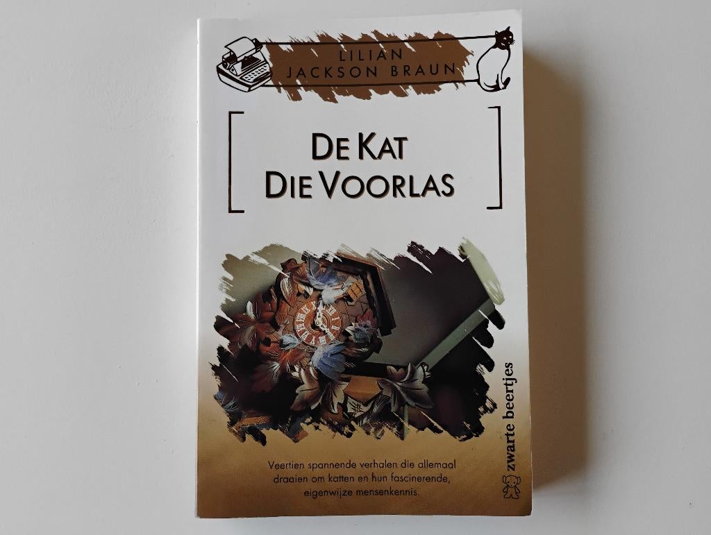 Boek De kat die voorlas L. Jackson Braun, Boeken, Detectives, Zo goed als nieuw, Ophalen of Verzenden