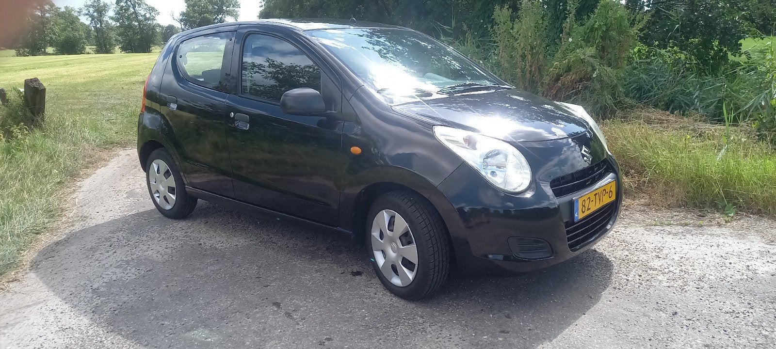 Suzuki Alto 1.0 2012 Zwart, Voorwielaandrijving, 200 kg, 4 stoelen, Origineel Nederlands