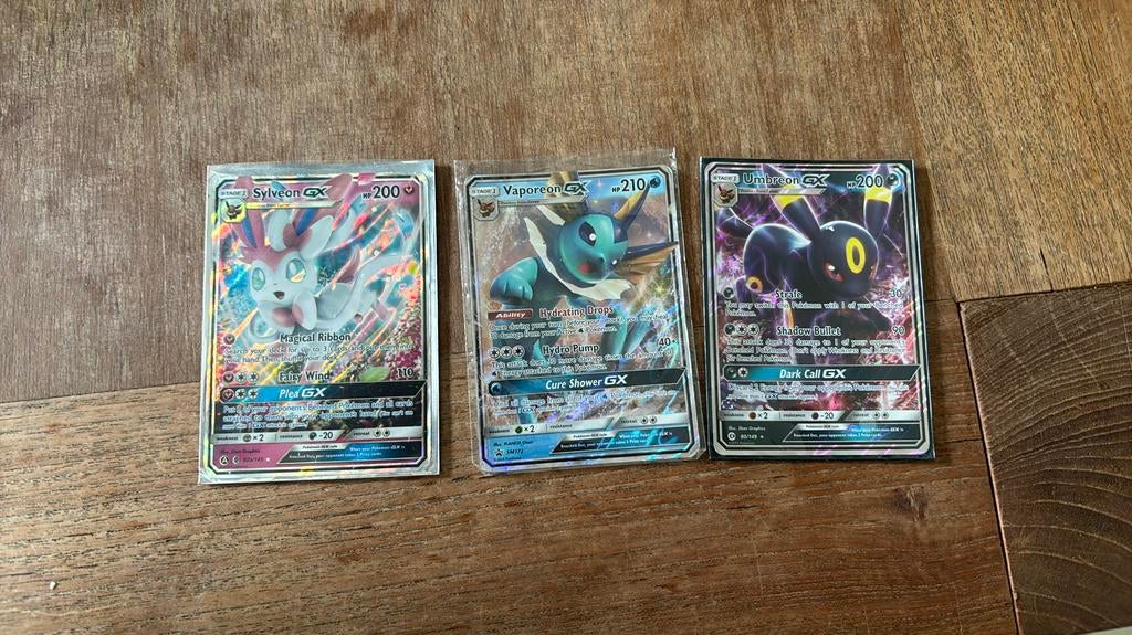 Sylveon, Vaporeon, Umbreon GX, Ophalen of Verzenden, Zo goed als nieuw