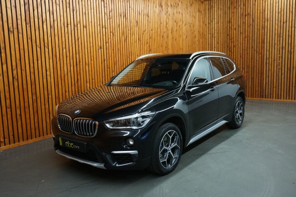 Bmw X1 sDrive 20 i X-line Automaat Panoramadak Clima, 1998 cc, Met garantie (alle), Zwart, Leder