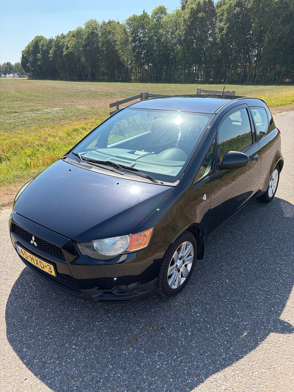 Te koop: zwarte Mitsubishi Colt 1.3 automaat, Stof, Multifunctioneel stuurwiel, Origineel Nederlands, Particulier