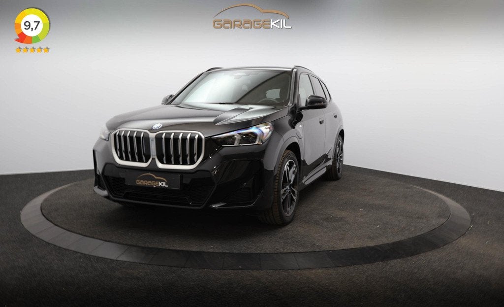 BMW X1 xDrive25e M-Sport Dealeronderh / Shadowline / Panoram, Auto's, BMW, Stof, Gebruikt, 16 kWh, Zwart